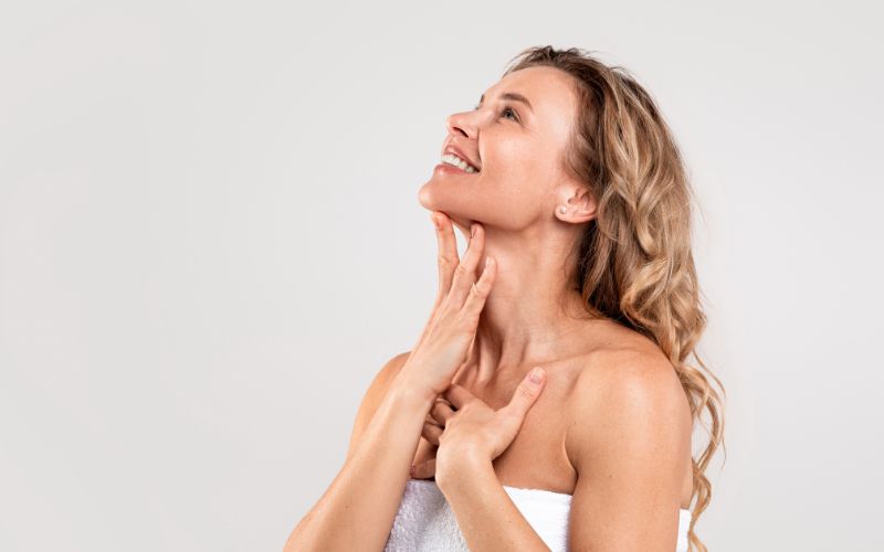 middle aged woman with beautiful skin smiling